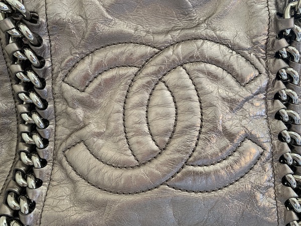 Chanel Pewter Logo